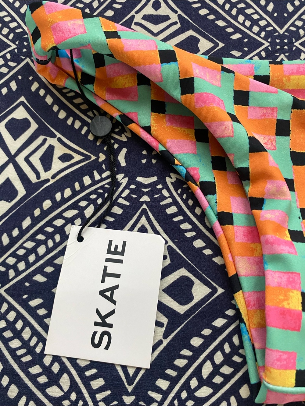 Skatie ' bikini bottoms in a colorful checkered "RADICAL" print - Picture 2 of 6